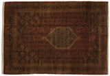 Vintage hand-knotted Indian Bijar carpet corner, showing thick pile, dusty rust Herati pattern and navy border.