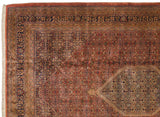 Vintage Indian Bijar carpet corner: navy border, dusty rust Herati field, medallion detail.