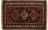 Intact side cord selvage and detailed floral borders on a vintage Shiraz design rug.