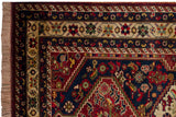 Vintage Shiraz rug corner with full pile, showing intricate floral borders and original selvage.