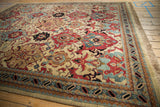 Vintage Agra rug's intact fringe and detailed border with slate blue and cherry red.