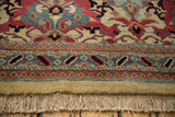 Vintage Agra carpet fringe and border with red, blue, beige palmette and geometric motifs.