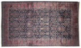 Fine Persian Sarouk carpet with a Mille Fleur Tree of Life motif on a deep indigo blue field and cochineal red border.