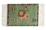 Vintage pictorial Armenian rug: celadon green lion design, geometric elements, 1'10