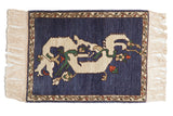 Vintage Armenian rug with an ivory dragon motif on an abrashed blue field and a detailed vine border.