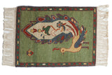Vintage pictorial Armenian peacock rug mat, abrashed green field, red and blue boteh border.