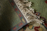 Original ivory fringe and tightly hand-knotted edge on a vintage Armenian pictorial rug.