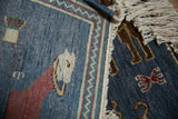 Vintage Armenian rug's original side cord selvage, reciprocating chevron border, and ivory fringe.