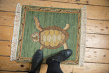 Vintage hand knotted Armenian pictorial turtle rug with emerald green field 1'10