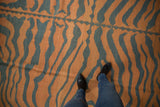 Vintage Indian Tiger Kilim with abstract pale rust and charcoal stripes, showcasing natural abrashes.