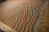 Pale rust and dusty charcoal tiger stripe Kilim pattern with fringe.