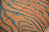 Fantastic abrashes across pale rust and dusty charcoal tiger stripe kilim texture.