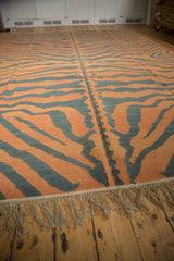 Natural fringe and bold pale rust, charcoal tiger stripe Kilim pattern.