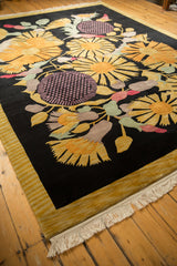 Cream fringe and ribbed gold border on the vintage Indian Art Deco rug.