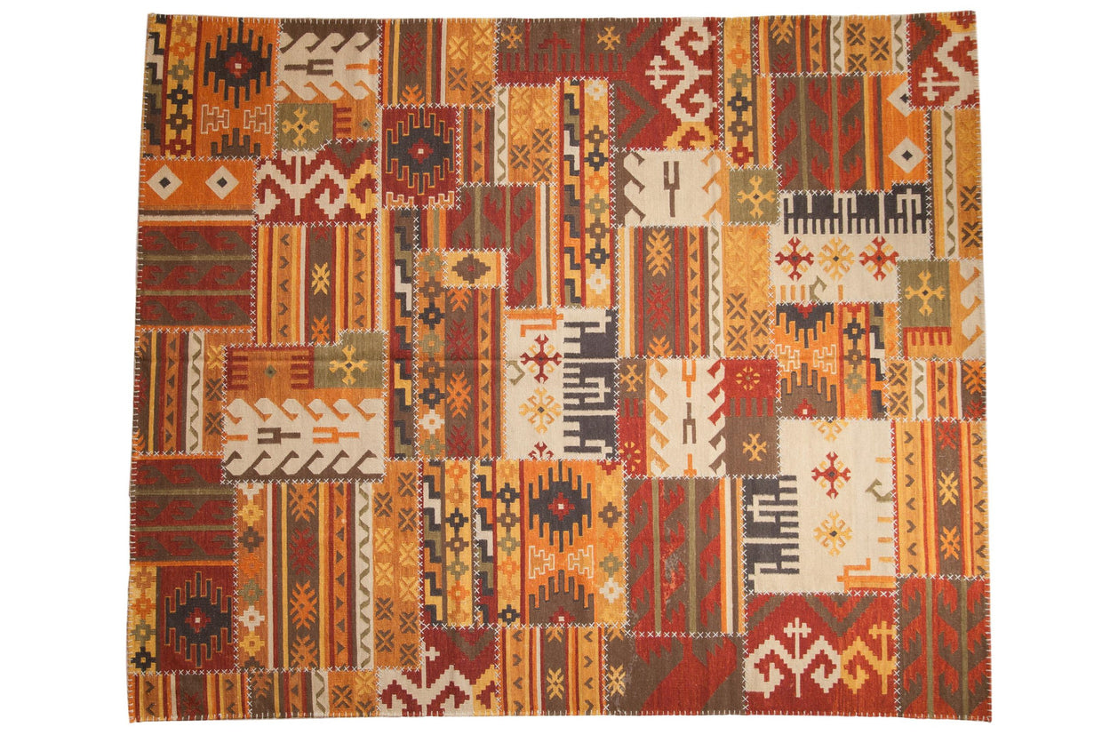 Indian Patchwork Kilim rug, warm palette geometric panels, raised cross stitches, 8'3