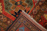 Pakistani Ersari design rug with white fringe, cord selvage, and geometric woven back.