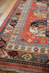 Red cord selvage and navy geometric border with traditional Ersari motifs.