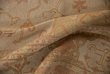 Hand-woven Indian Soumac texture, featuring beige and dusty rose floral vinery motif.