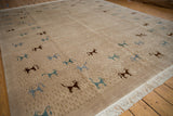 Detail of the Indian carpet's intact side cord selvage and clean, original white fringe.