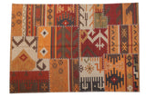 New Patchwork Kilim rug, fragmented geometric panels in a warm multi-color palette.
