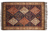 Vintage Indian Shiraz design rug with stepped medallions and geometric birds in navy blue, ivory, and chestnut.