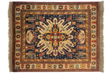 Vintage Indian Kazak rug: starburst medallion, multi-tiered floral blossoms on navy, ivory, rust, 4'6