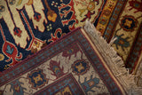 Tight hand knotted reverse, intact selvage, and cream fringe of a vintage Indian Kazak rug.