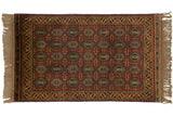 Hand knotted Indian Caucasian rug, red geometric field, gold vine border. 3'1