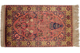 Vintage Indian Bakhtiari rug with a tree-of-life design in dusty red, navy blue, and gold.