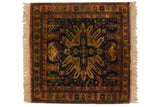 Vintage Indian Kazak square rug with gold starburst medallion, navy field, rust florals.