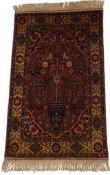 Lustrous traditional Bakhtiari design vase with floral blossoms in rust red, navy, gold.
