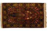 Vintage Indian Bakhtiari rug with tree-of-life design, perched birds, and a vase on a red field.