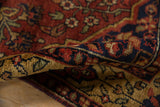 The plush, high-luster pile of a vintage Bakhtiari rug shown in a detailed fold.