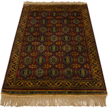 A vintage Indian Caucasian rug with rich color saturation and a lustrous, high pile.