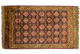 Vintage Indian Caucasian design rug with an allover geometric pattern in navy blue, gold, and wine red.