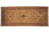Vintage Kerman carpet with an allover millefleur floral design on an ivory field, featuring a small blue medallion and red border.