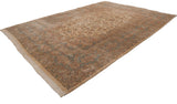 Traditional Kerman carpet with allover floral sprays, ivory field, and blue-peach border.