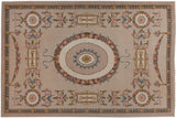 Vintage Spanish Savonnerie carpet, detailed with pink roses, blue ribbons, and corner medallions.