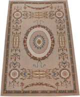 Vintage Spanish Savonnerie carpet with beige, pink, and blue corner floral roundel design.