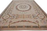 Vintage Spanish Savonnerie carpet with rose wreaths, scrolling leaves, and powder blue ribbons.