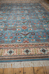 Even ivory fringe and geometric border details of a vintage Indian Shirvan carpet.