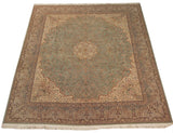 Vintage square Kerman design carpet in mint green with a floral medallion and intricate borders.