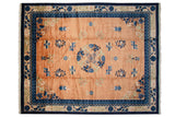 Vintage Peking carpet with a central medallion, flying bats, and florals on a pale copper field.