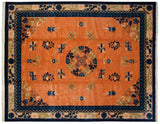 Vintage Peking carpet with a copper field of floral sprays and complex indigo blue borders.