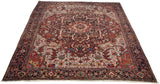 Angled perspective of a collector's vintage Heriz carpet, emphasizing its grand scale and intricate geometric medallion.