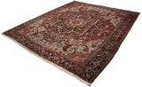 Angled view of a vintage Heriz carpet's grand medallion, corner spandrels, and colorful, intricate field.