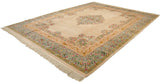 Full perspective view of the vintage Kerman design carpet, highlighting its medallion and floral layout.