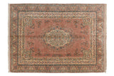 Vintage Kerman carpet with dusty rose field, ornate floral medallion, and delicate vinery, 9'10