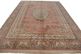 Vintage Indian Kerman rug corner, depicting fringe, Safavid-inspired dragon border, and floral motifs.