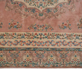 Indian Kerman border detail with dusty rose, ivory Rococo vines and Safavid dragon motif.
